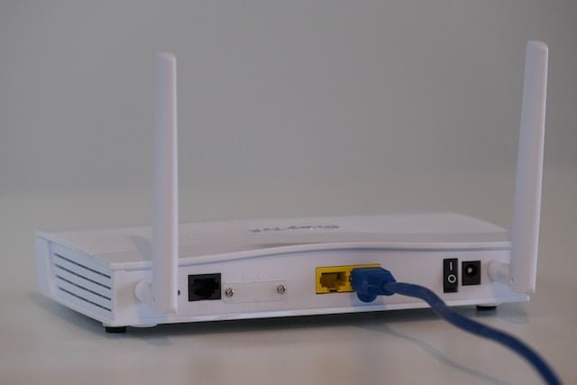 White dual-band router with two antennas